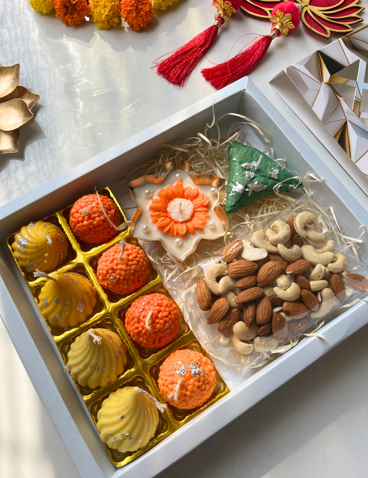 Premium Diwali Gift Hamper with Sweets Candles, Urli & Nuts