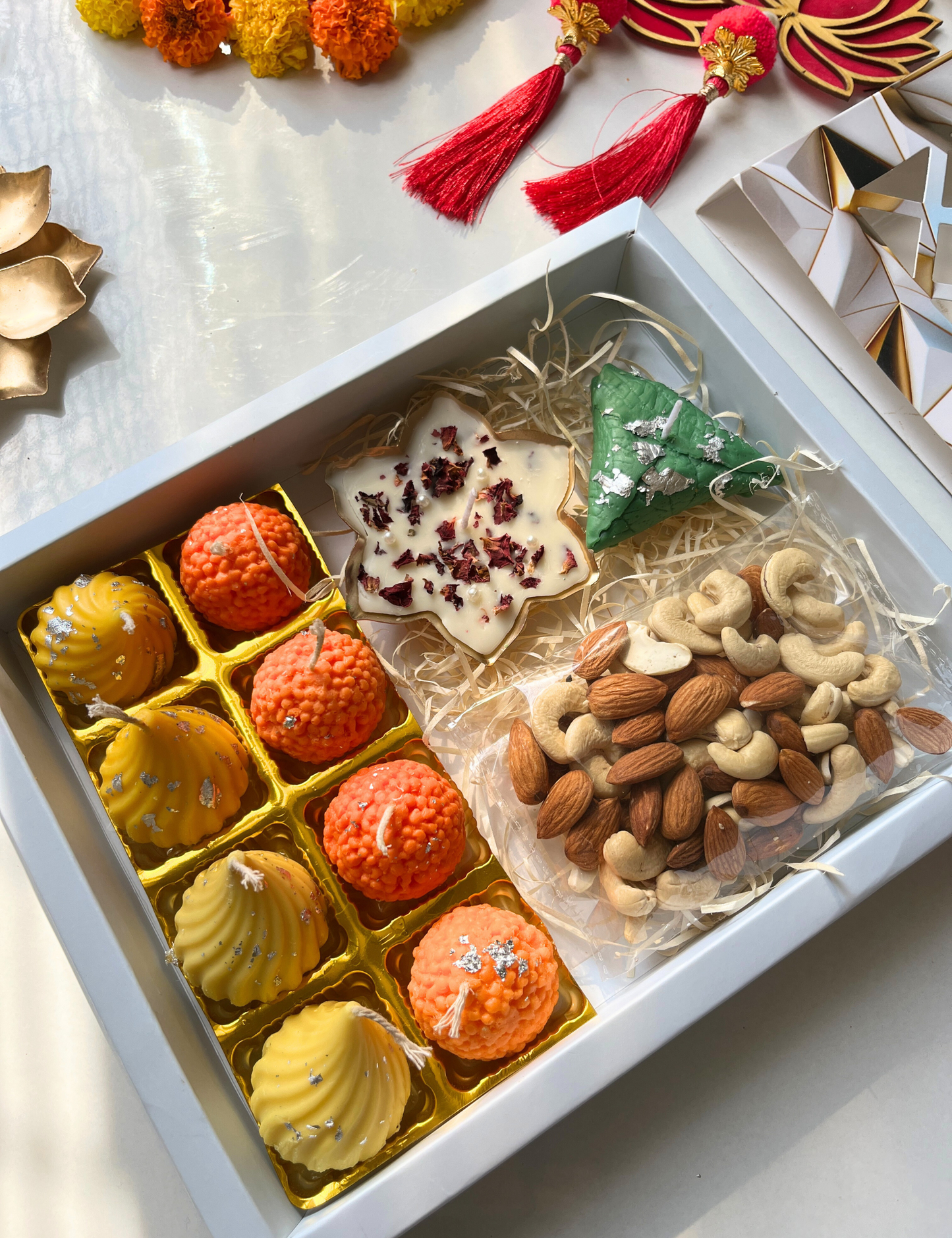 Premium Diwali Gift Hamper with Sweets Candles, Urli & Nuts